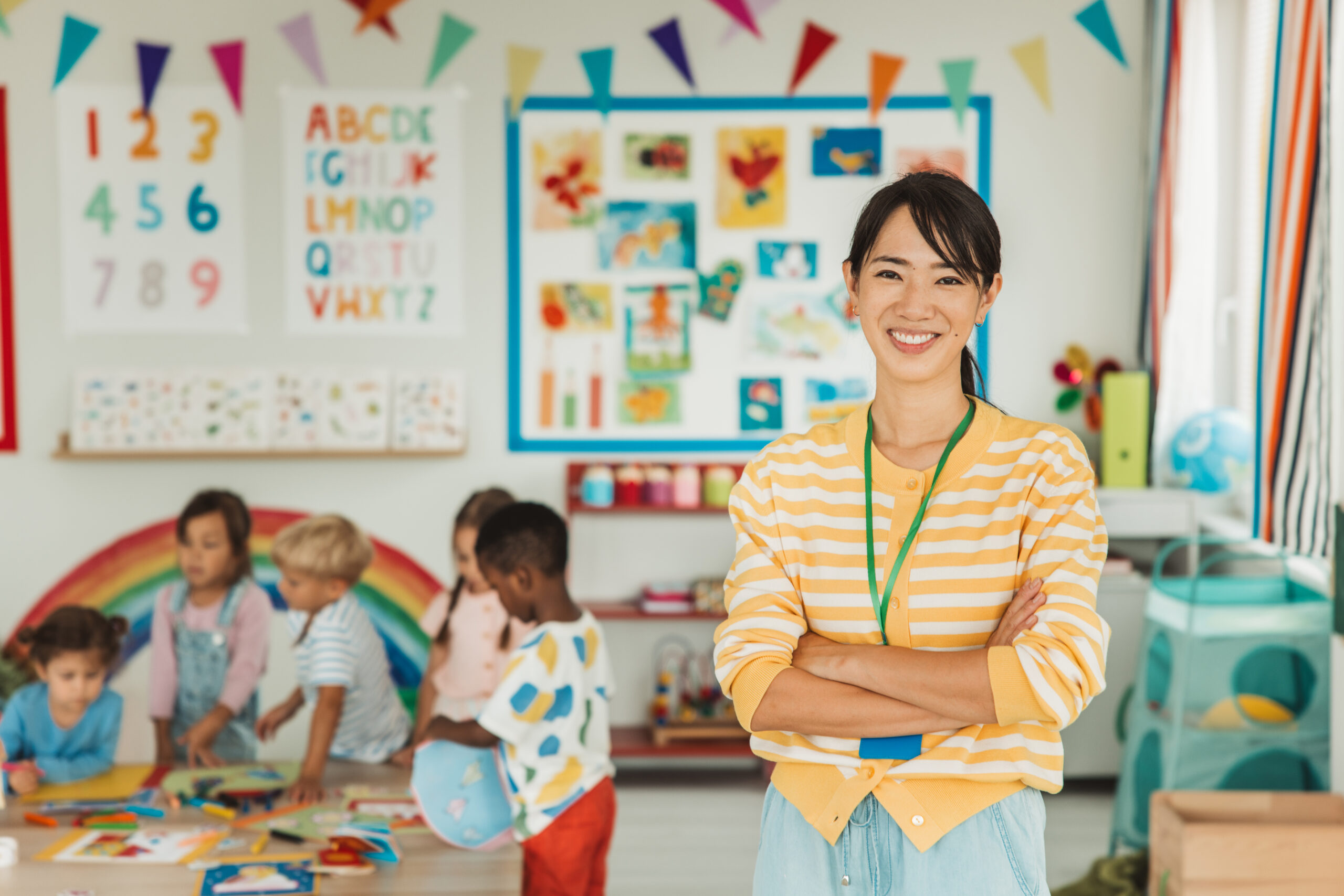 Educator in classroom - Hero image